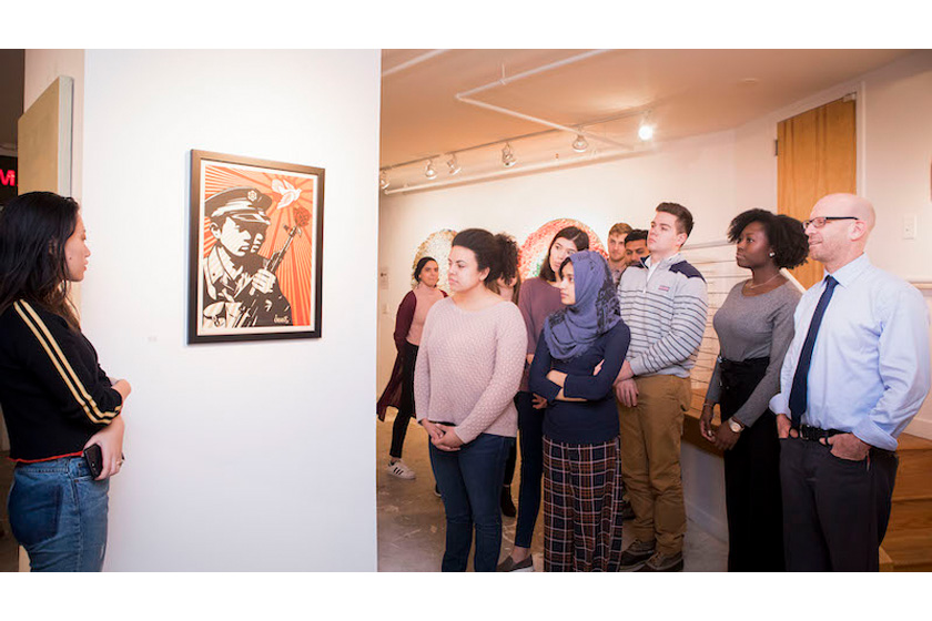 a group of students in an art gallery